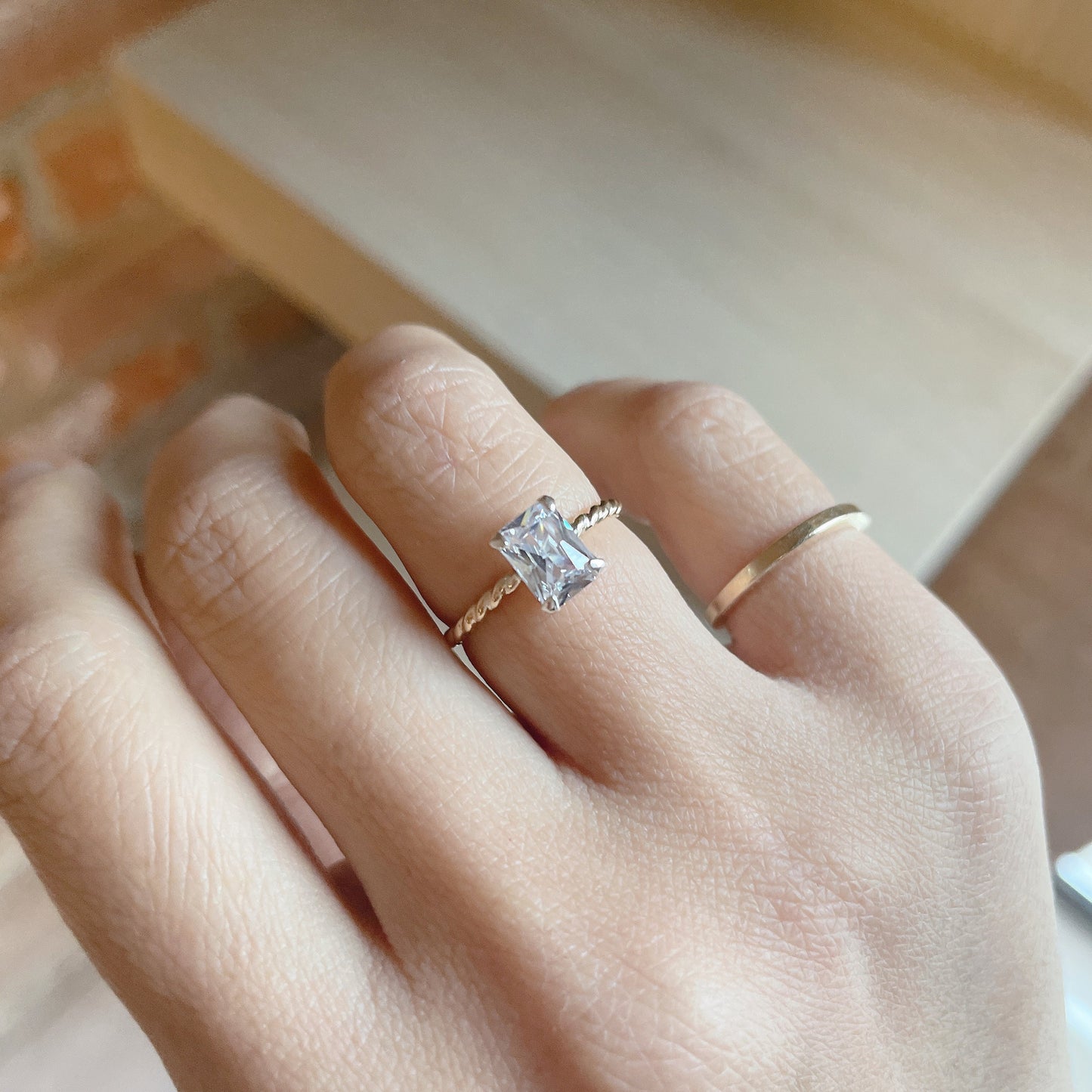 14KGF Emerald Cut CZ Ring: Twisted Band Solitaire
