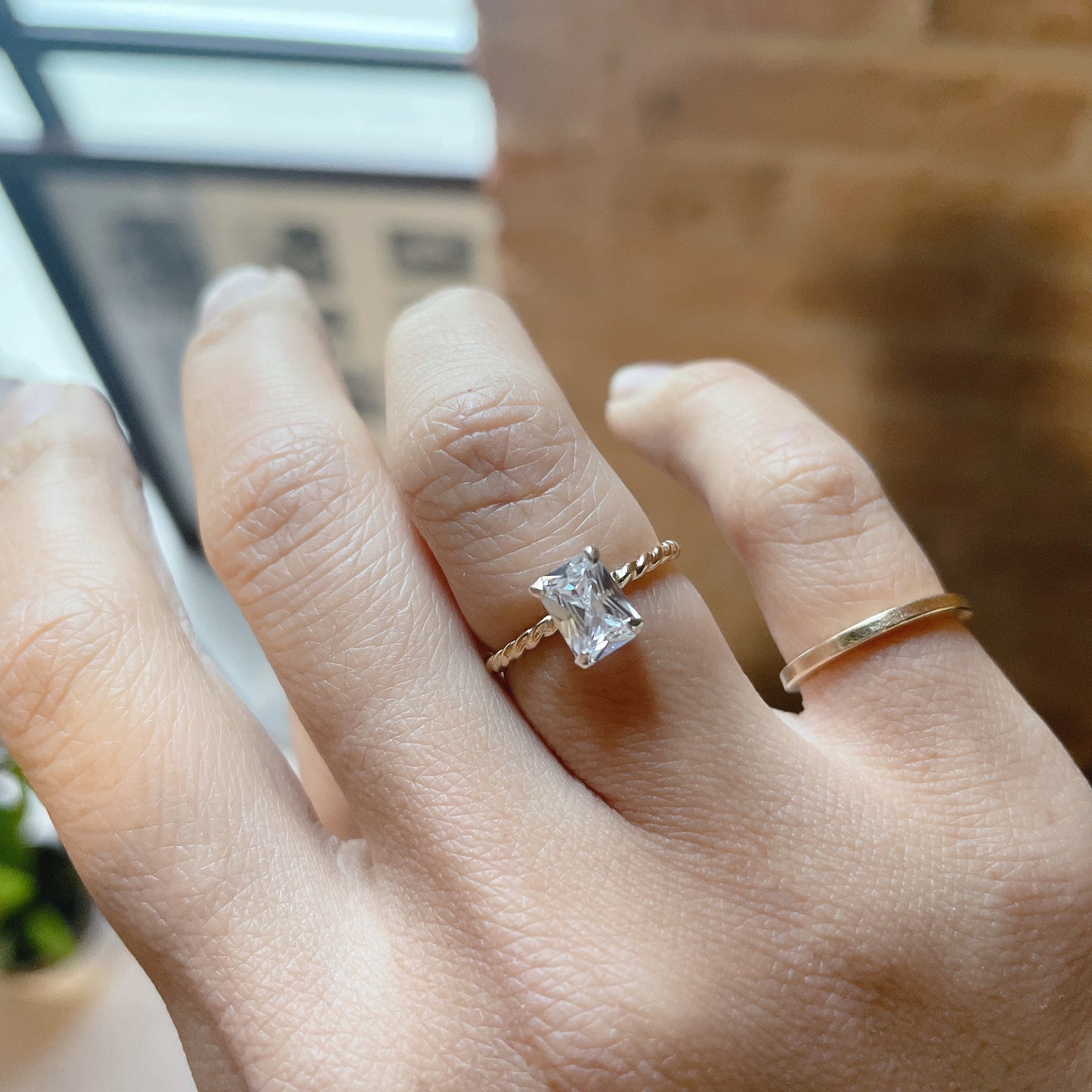 14KGF Emerald Cut CZ Ring: Twisted Band Solitaire
