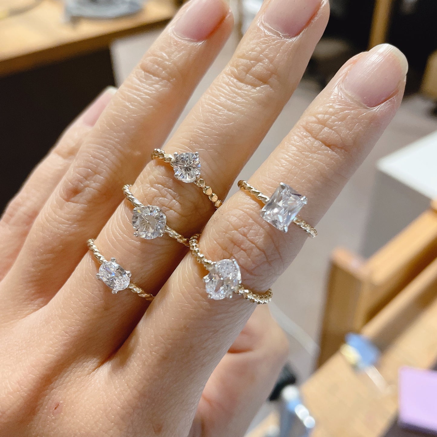 14KGF Emerald Cut CZ Ring: Twisted Band Solitaire