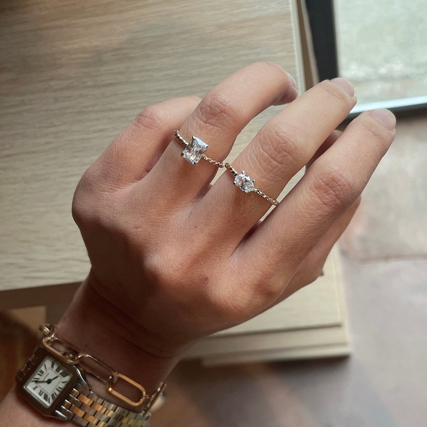 14KGF Emerald Cut CZ Ring: Twisted Band Solitaire