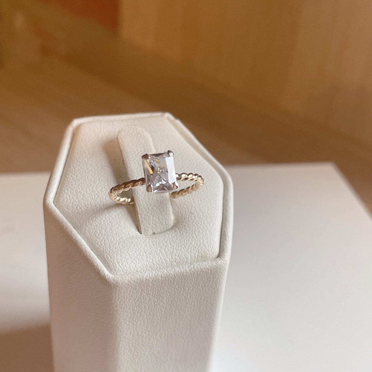 14KGF Emerald Cut CZ Ring: Twisted Band Solitaire