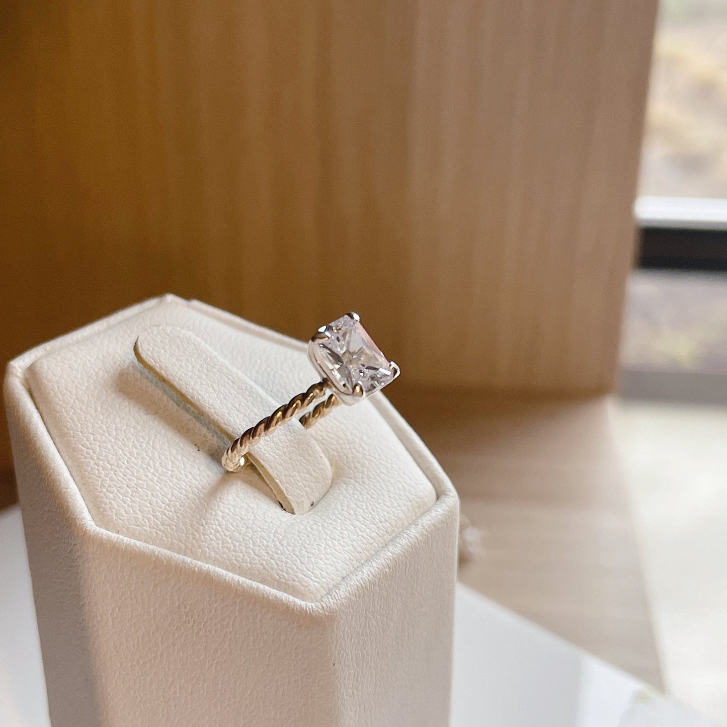 14KGF Emerald Cut CZ Ring: Twisted Band Solitaire